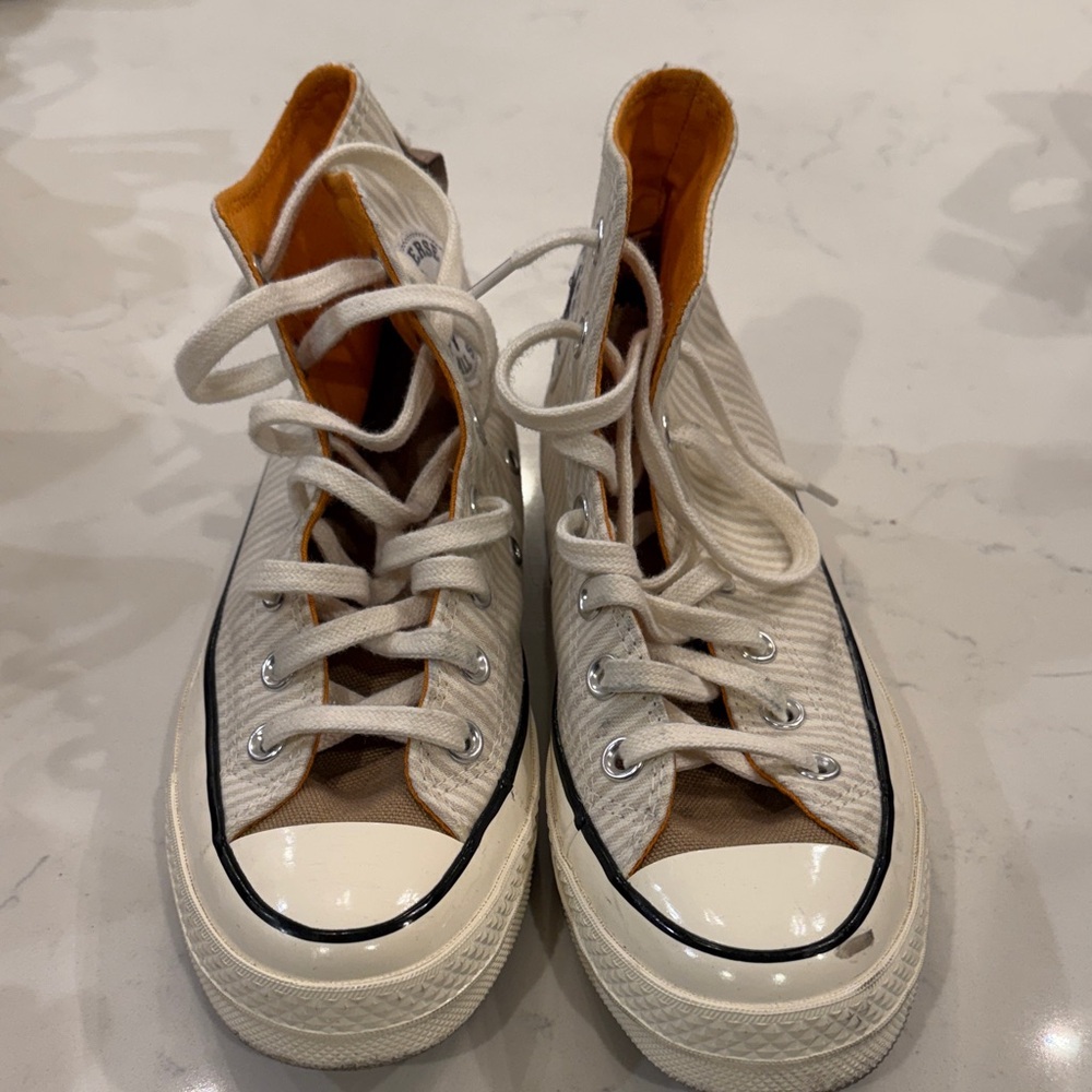 High-Top Converse Sneakers with Orange Lining